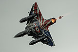 Ramex Delta, flche de Sioux. 
https://www.youtube.com/watch?v=8WnZogckw6Y 
 
Photo Nick Collins